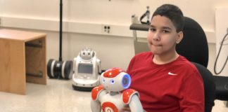Seventh grader Jaryn Bibb participated in a study at UofL that helps students with autism prepare for real classrooms by working with robots.