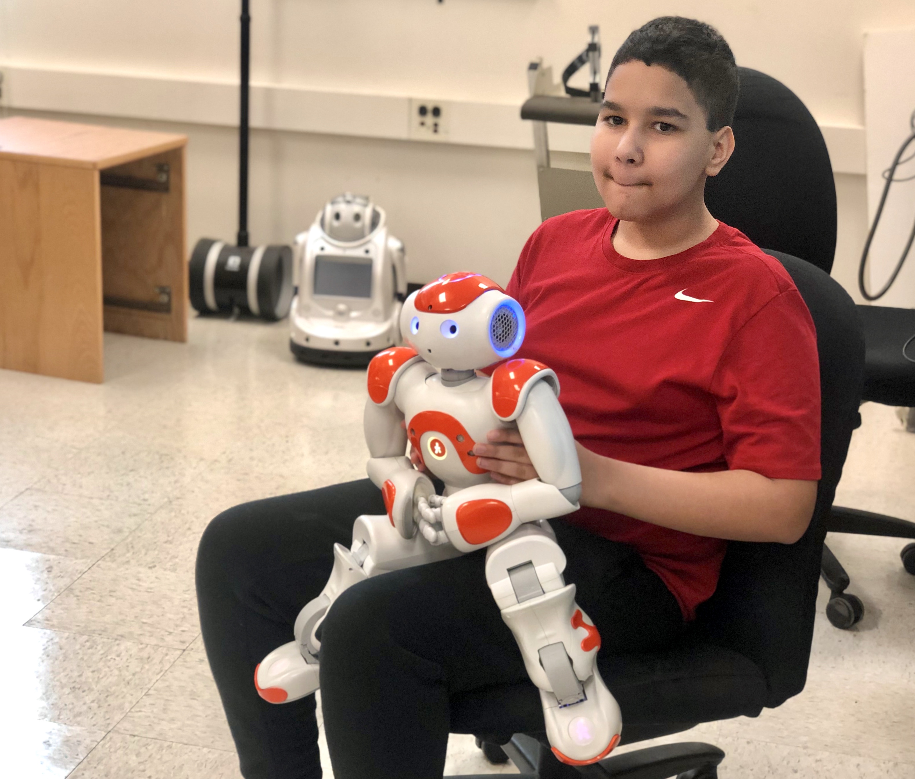 Seventh grader Jaryn Bibb participated in a study at UofL that helps students with autism prepare for real classrooms by working with robots.