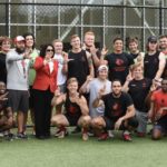 The UofL Rugby Team poses with President Neeli Bendapudi