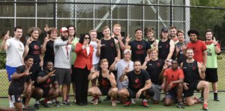 The UofL Rugby Team poses with President Neeli Bendapudi