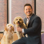 Cuddle Clones co-founder Adam Greene, his dog Teddy, and Teddy's clone.