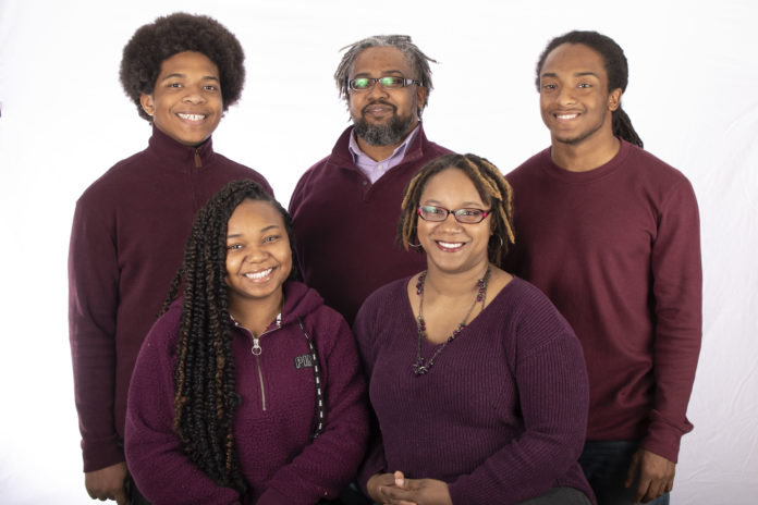 Frazier UofL spring graduate Front row, L to R: Azariah and La-Tisha Frazier Back row, L to R: Braxton, Steven and Keilen Frazier