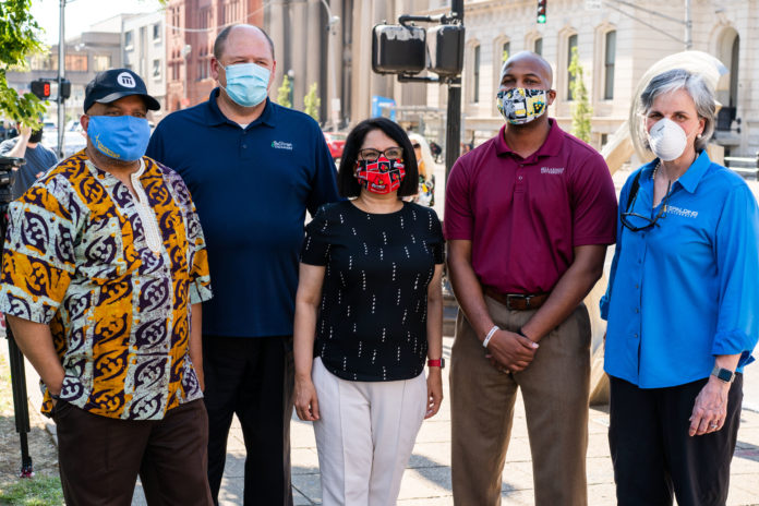 Neeli Bendapudi joins local leaders at a BLM protest.