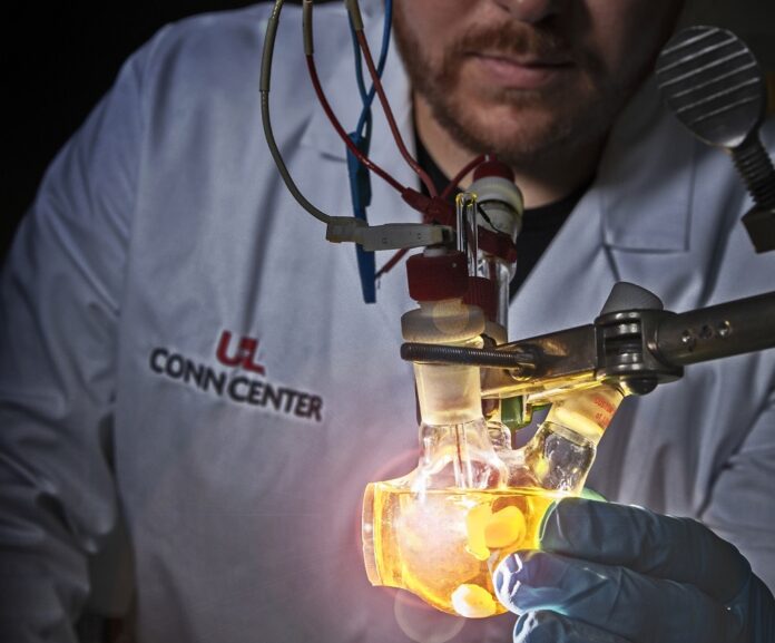 UofL chemistry graduate student Jacob Strain conducts a catalysis experiment at the Conn Center