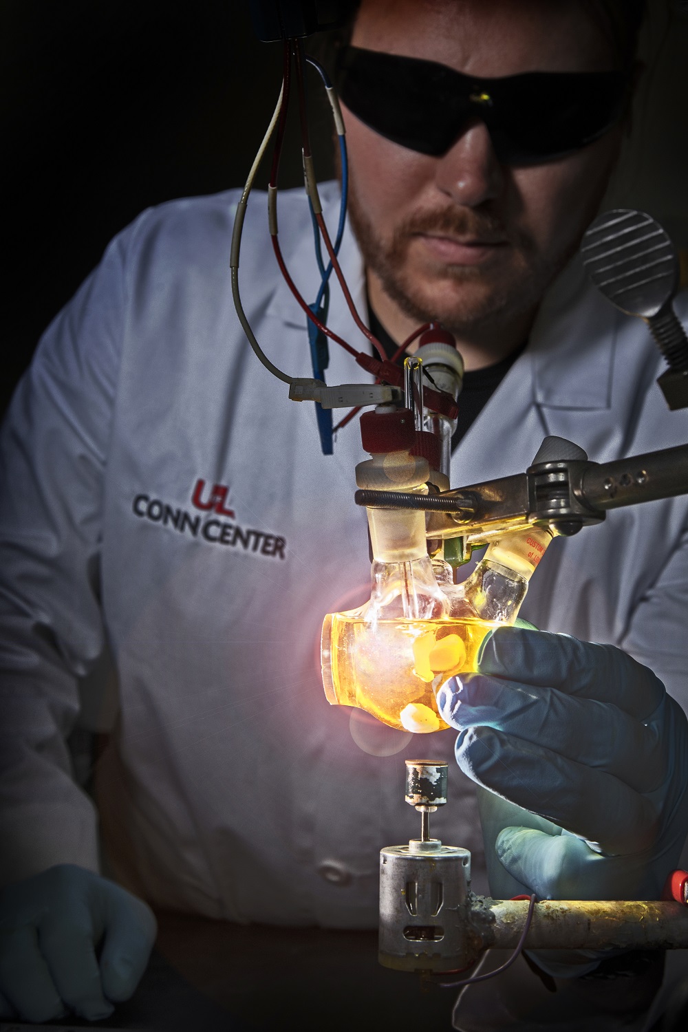 UofL chemistry graduate student Jacob Strain conducts a catalysis experiment at the Conn Center. UofL photo by Tom Fougerousse.