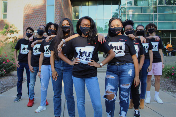 From left to right: Frederik Mendoza Ulken, Gary Jones, Amari Hardin, Madeline Martinez, Kamrin Green, Malyah Spencer, Maya Dotson, Ana Nickel, Nino Owens. Photo by Jenna Leilani Chong Huber.