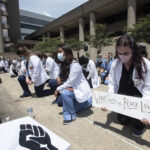 Medical students, residents and faculty take part in White Coats for Black Lives