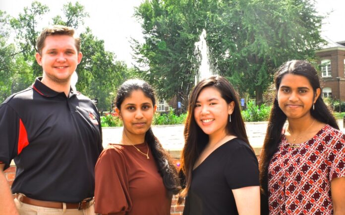 Chief editors of The Cardinal Edge, l to r, Sam Kessler, Jahnavi Sunkara, Betty Ngo and Priya Chandrashekhar