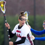 Shayla Scanlan playing lacrosse.