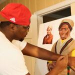 Javion Duncan ('20) painting in his studio.