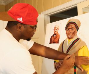 Javion Duncan ('20) painting in his studio.