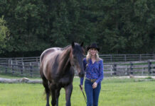 Elizabeth James, Ph.D., with her horse, Ozzie. (Photo by Alaina Alderman)