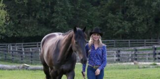 Elizabeth James, Ph.D., with her horse, Ozzie. (Photo by Alaina Alderman)