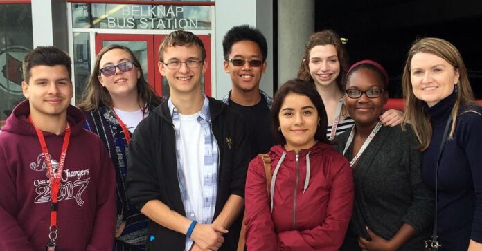 Jami McCoy Allen (right) visits UofL with her students.