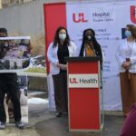 Christopher 2X with UofL medical students Jenci Hawthorne, Karen Udoh and Briana Coleman at the presentation of the Kelsie Small Future Healer Award on Feb. 23.