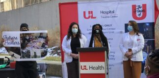 Christopher 2X with UofL medical students Jenci Hawthorne, Karen Udoh and Briana Coleman at the presentation of the Kelsie Small Future Healer Award on Feb. 23.