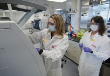 Eli Lilly and Company staff conducting release and stability testing of the clinical trial materials. Photo courtesy Eli Lilly and Company