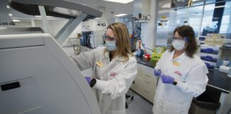 Eli Lilly and Company staff conducting release and stability testing of the clinical trial materials. Photo courtesy Eli Lilly and Company