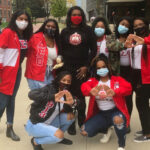 Photo of Terina Matthews Davis and Delta Sigma Theta women at the NPHC plot unveiling ceremony.