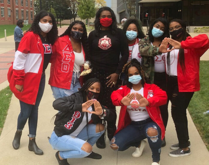 Photo of Terina Matthews Davis and Delta Sigma Theta women at the NPHC plot unveiling ceremony.