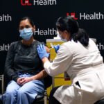 UofL Health distributes a COVID-19 vaccination