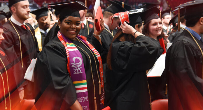 University of Louisville graduates at a commencement ceremony