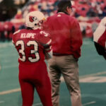 Kathryn Klope vanTonder awaits her opportunity in full uniform to play in a football game in the old Cardinal Stadium.