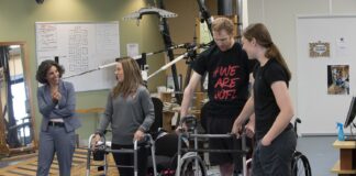 Claudia Angeli, Ph.D., left, with UofL research participants Kelly Thomas and Jeff Marquis and trainer Kristin Benton