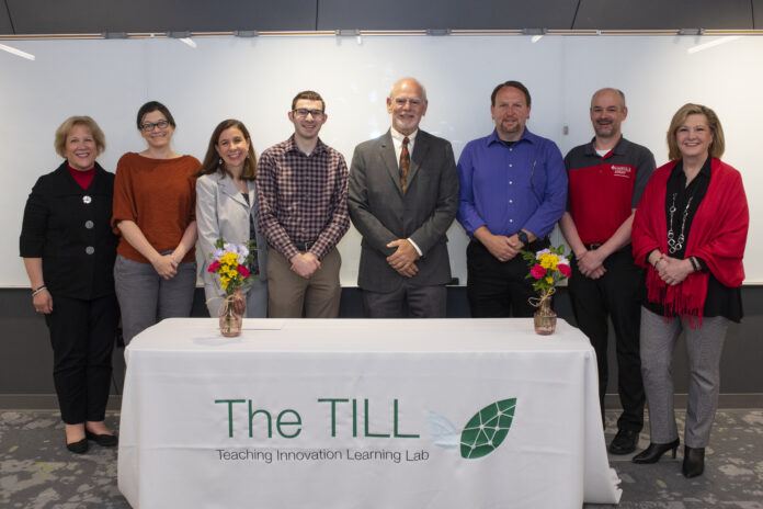 Winners of the inaugural TILL Teaching Innovation Award, along with Provost Lori Gonzalez (far right)