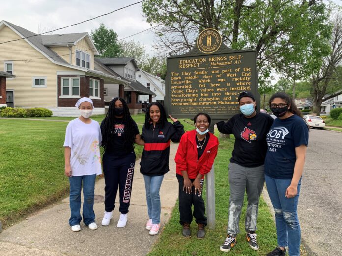 A group of UofL students, employees and alumni helped clean up the Muhammad Ali Childhood Home ahead of the city's Ali Week.