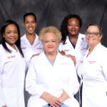 UofL School of Dentistry's African American female faculty members: Madeline Hicks (seated) with Breacya Washington, Amirah Jackson, Tiffany McPheeters and Sherry Babbage (standing L-R).