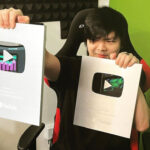 VG posing with YouTube Silver Play buttons.