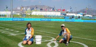 UofL Professor Mary Hums (right) at the Athens Olympics in 2004