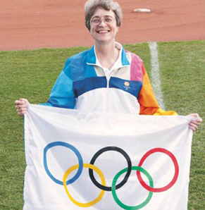 UofL Professor Mary Hums (right) at the Athens Olympics in 2004