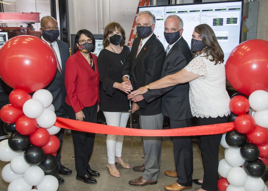 UofL J.B. Speed School of Engineering Dean Emmanuel Collins, left, and UofL President Neeli Bendapudi with the children of Bernard A. Dahlem.