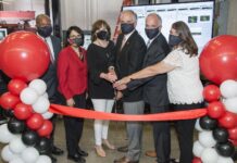 UofL J.B. Speed School of Engineering Dean Emmanuel Collins, left, and UofL President Neeli Bendapudi with the children of Bernard A. Dahlem.