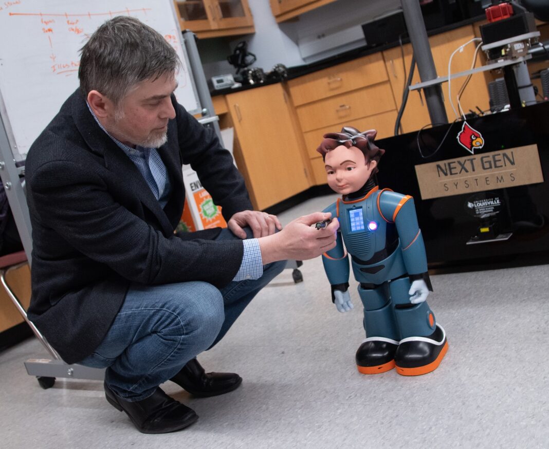 Dan Popa and other researchers at the Louisville Automation and Robotics Research Institute at the University of Louisville (LARRI) use social robots to focus on treating cognitive impairments in children on the autism spectrum. University of Louisville photo.