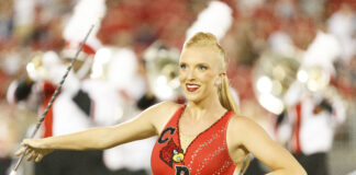 Morgan Proctor twirling a baton.