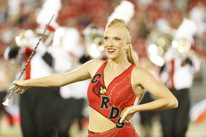 Morgan Proctor twirling a baton.