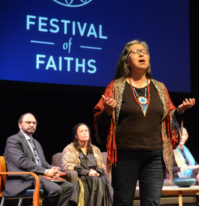 Woman Stands Shining, Dine Navajo elder wisdom keeper, at the 2019 Festival on Faiths. -Photo by John Nation