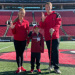 6-year-old Beckham Goodale, middle, will take over for Band Director Amy Acklin Saturday for the annual Marching Together event to spotlight Norton Children's Hospital patients and raiseRED.