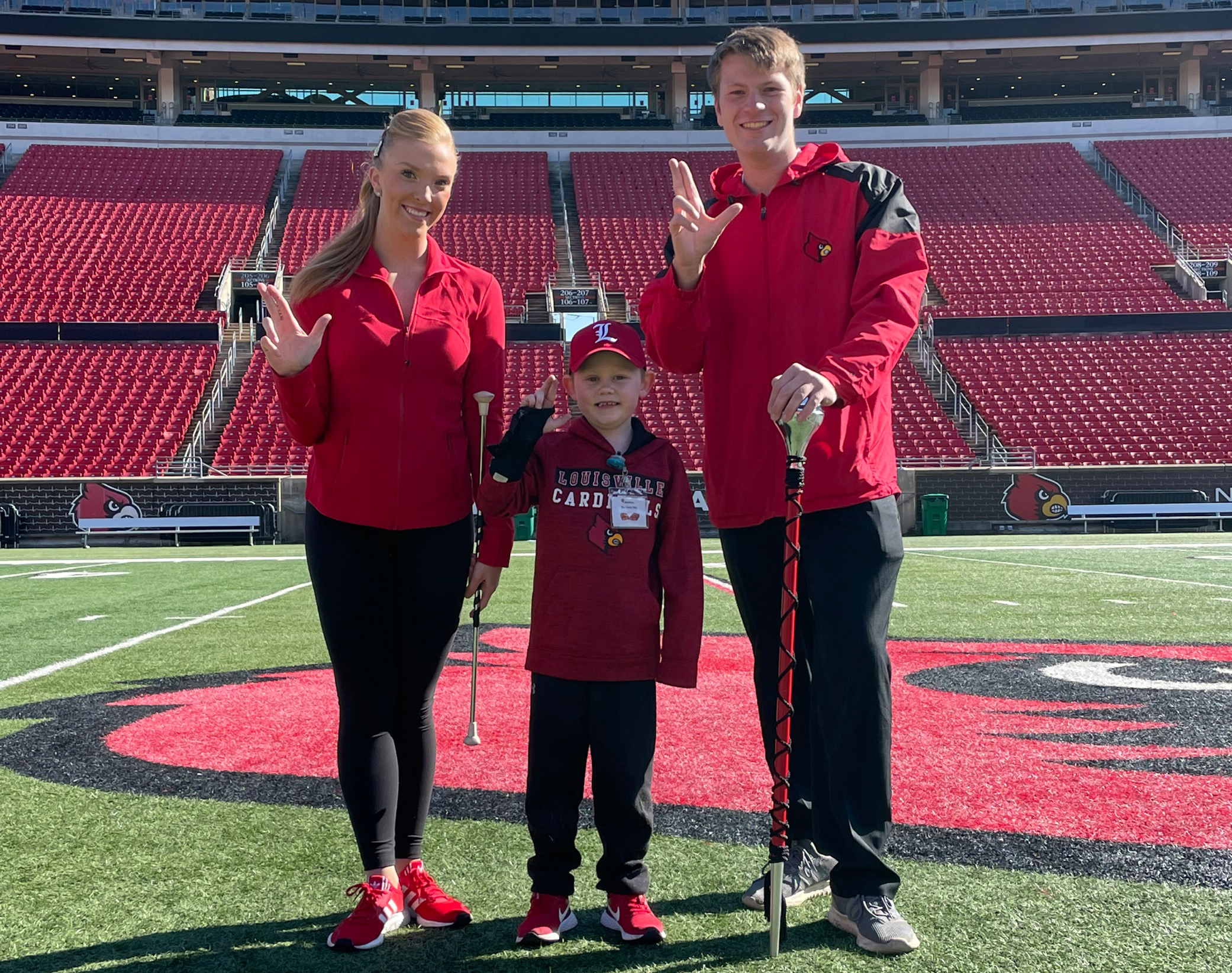 6-year-old Beckham Goodale, middle, will take over for Band Director Amy Acklin Saturday for the annual Marching Together event to spotlight Norton Children's Hospital patients and raiseRED.