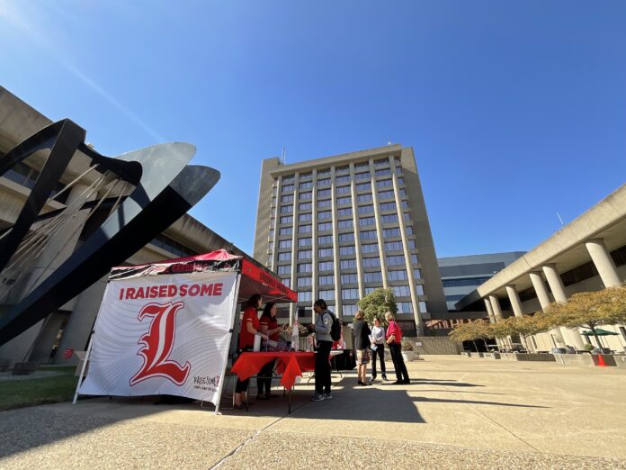 Student donors could win a prize and take a selfie against a campaign backdrop at campus headquarters during the Raise Some L day of giving.