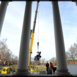 The Thinker on the steps of Grawemeyer Hall was removed via crane in 2012 for restoration efforts.