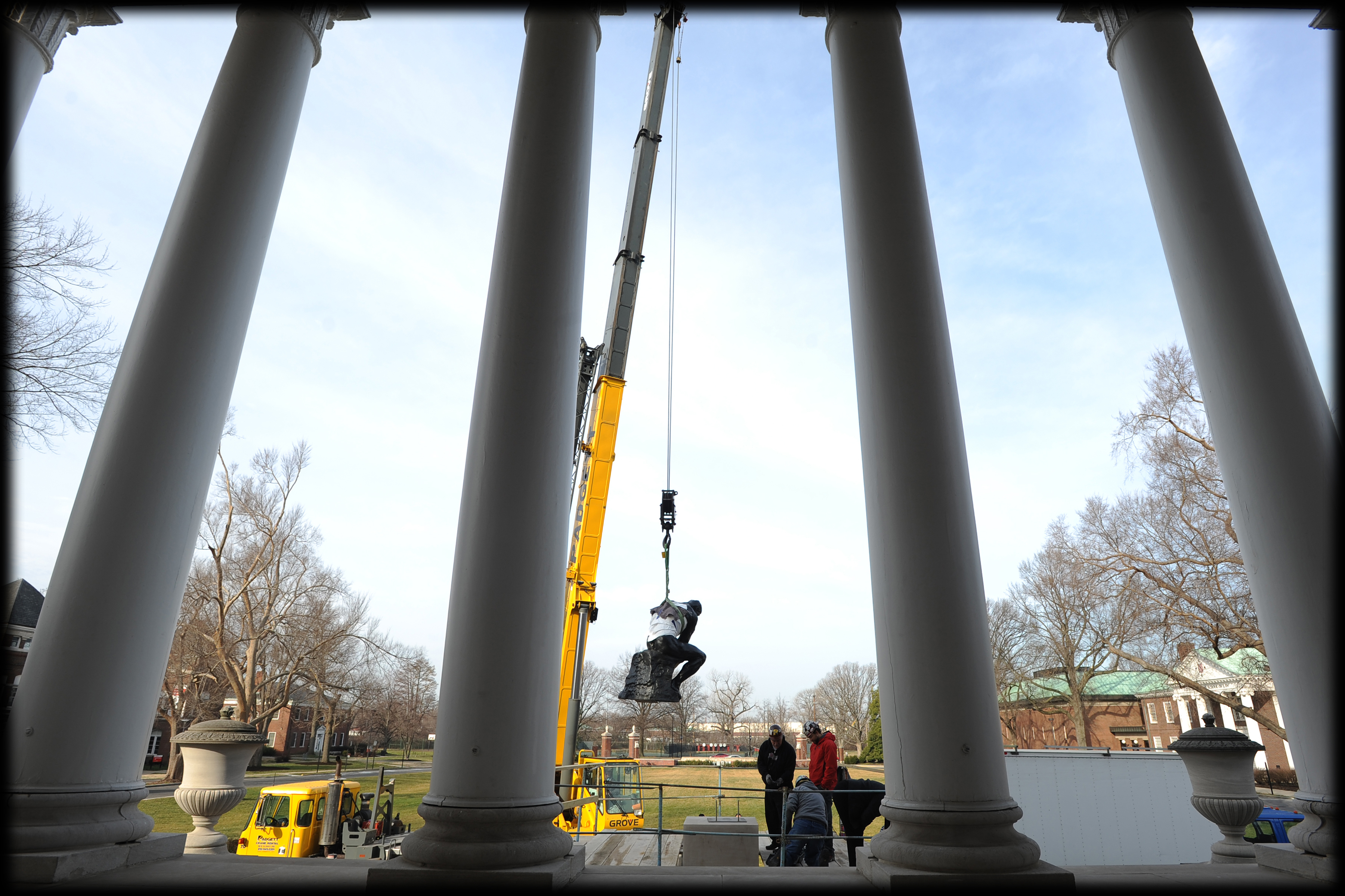The Thinker on the steps of Grawemeyer Hall was removed via crane in 2012 for restoration efforts.