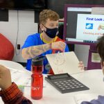 UofL student teaching in a classroom.