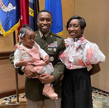 Sgt. First Class Courtland Leamon, center, is a December 2021 graduate of the University of Louisville, where he earned his master of arts degree in higher education. Pictured with Courtland are his daughter, Cereniti, and his wife, Krystle.