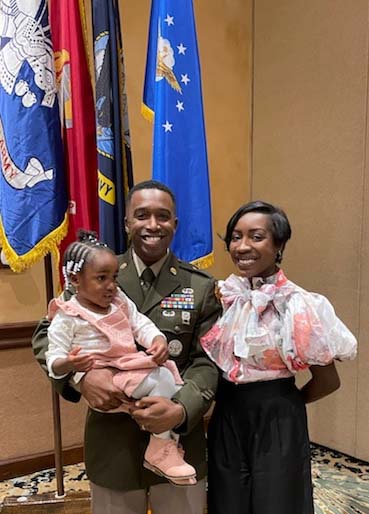Sgt. First Class Courtland Leamon, center, is a December 2021 graduate of the University of Louisville, where he earned his Master of Arts degree in higher education. Pictured with Courtland are his daughter, Cereniti, and his spouse, Krystle.
