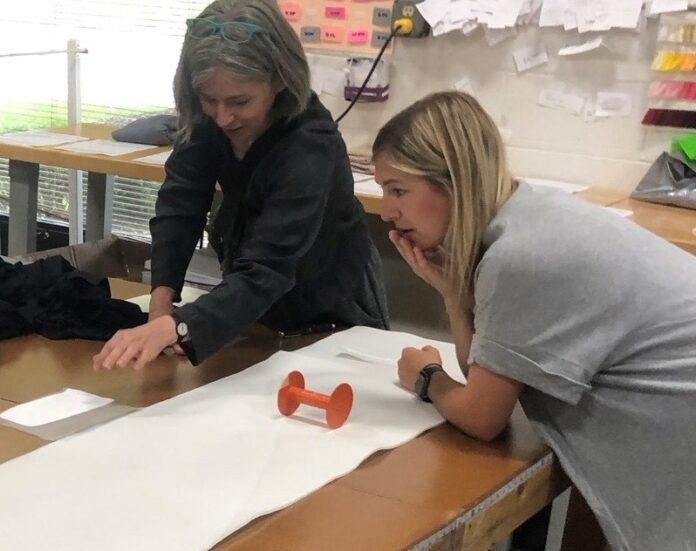 UofL engineering researcher Cindy Harnett, left, with Alli Truttmann of Wicked Sheets