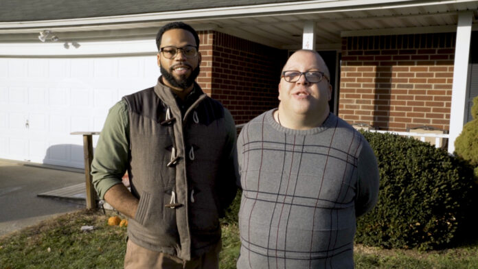 Alumnus Berrac Strode with one of his clients.